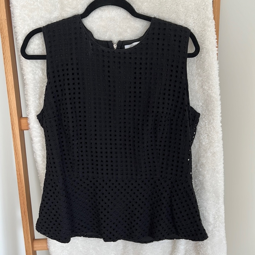 Black eyelet peplum top